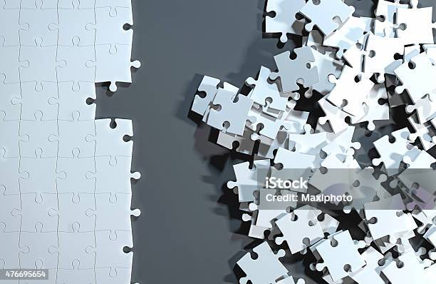 Partially Completed Puzzle Finding A Solution To Messy Pieces Stock Photo - Download Image Now