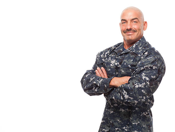 istock Navy man with arms crossed and smirk. 476696076