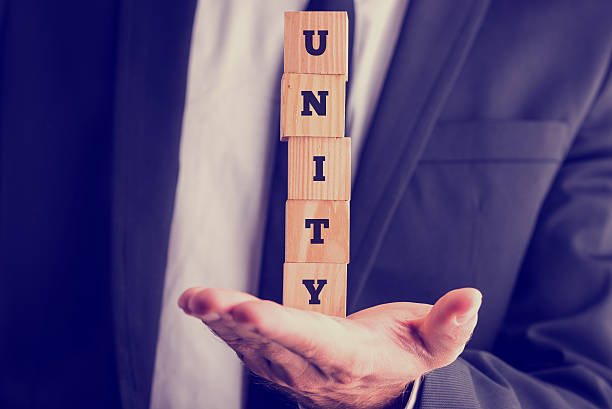 istock Five wooden cubes spelling the word Unity 476696532