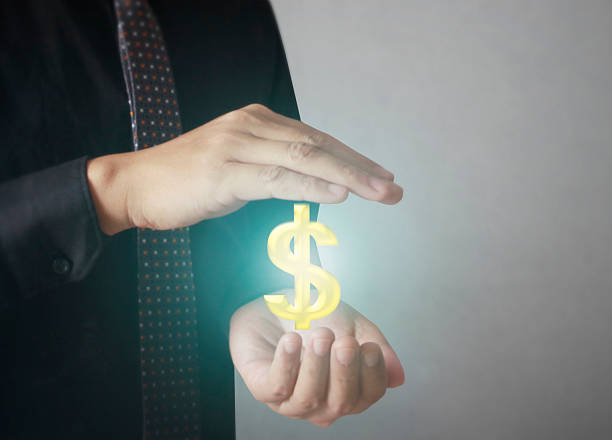 istock Man touching online button with money icon 476696728