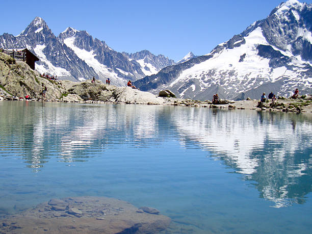 istock Snow-capped peaks and the mountain lake 476696765
