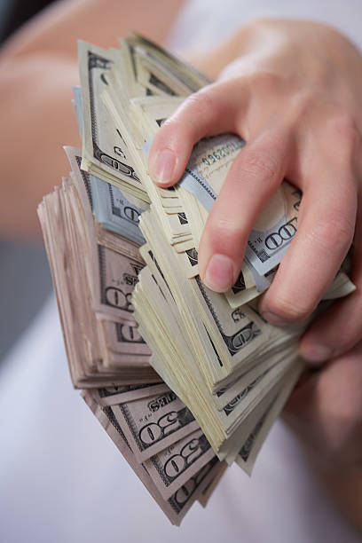 istock Money in female hands 476700820