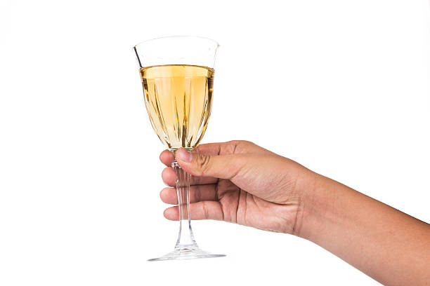 istock Hand holding white wine in crystal glass ready to toast 476700992