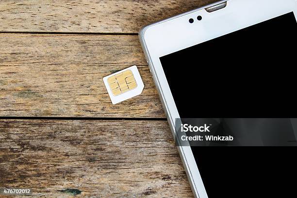 Smart Phone Use With Micro Sim Card Black Screen Stock Photo - Download Image Now - SIM Card, Greeting Card, Telephone