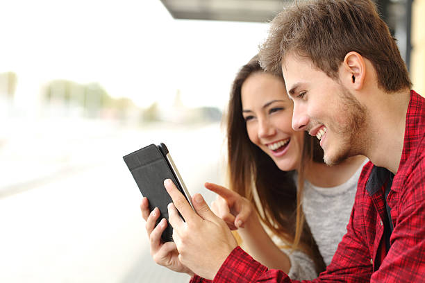 istock Couple sharing media content from a tablet 476702260