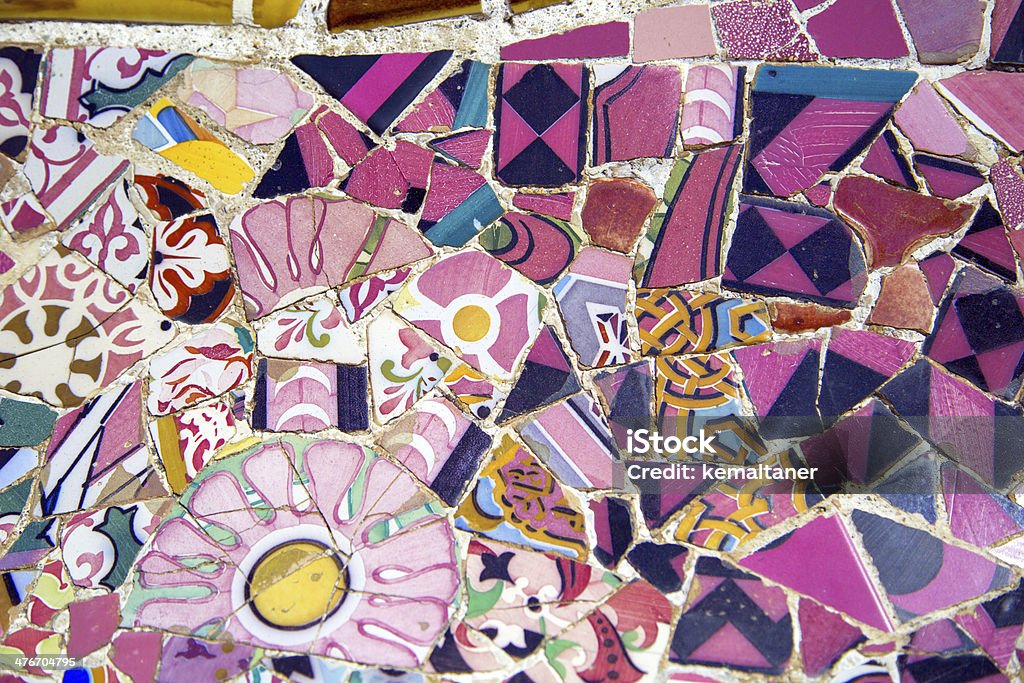 Floral mosaic in Park Guell, Barcelona, Spain Park Guell in Barcelona, Spain. It is part of the UNESCO World Heritage Site "Works of Antoni Gaudi. Antoni Gaudí Stock Photo