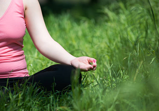 istock woman doing yoga 476705308