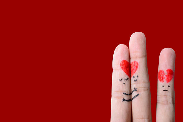 istock happy couple in love with painted smiley and hugging 476708323