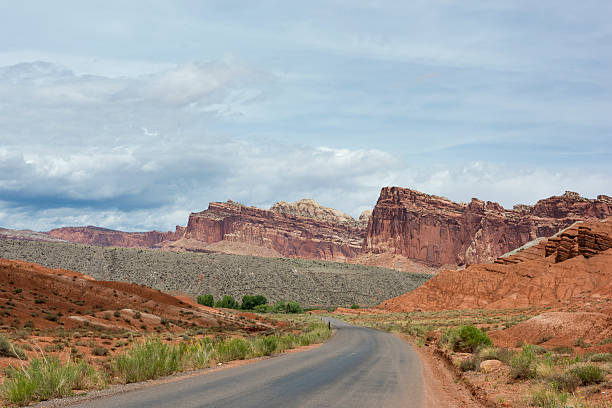 istock Redrock scenery with a winding road 476709720