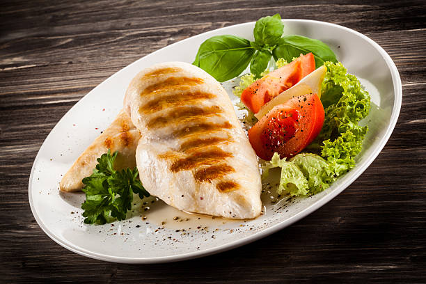 istock Roast chicken fillets and vegetables 476709998