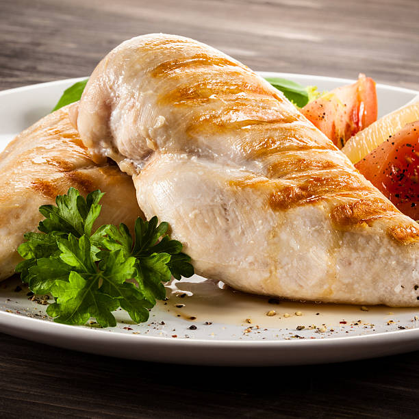 istock Roast chicken fillets and vegetables 476710006