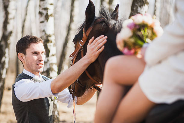 istock Young people horseriding 476711670