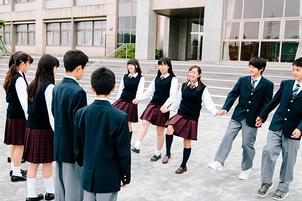 istock Japanese high school. Students exercise outside, building exterior, playground 476713942