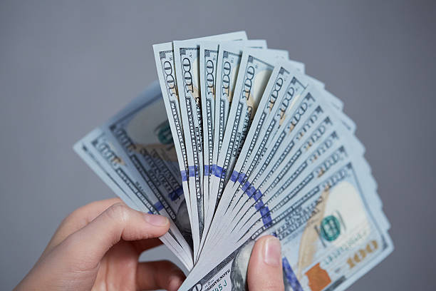 istock Money in female hands 476714920