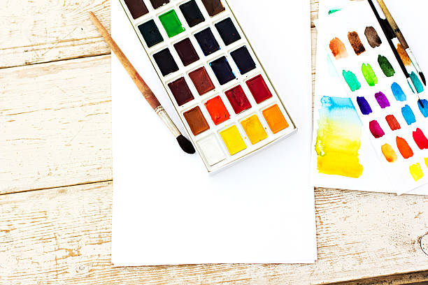 istock Workplace artist - paper, paint, brushes, color wheel 476715114
