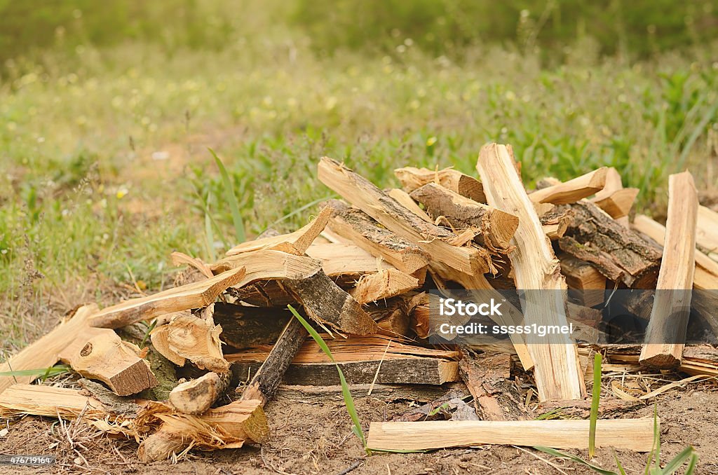 Heap of chopped firewood Heap of chopped firewood, detail 2015 Stock Photo