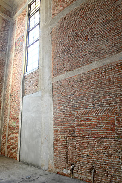 istock Sunlight from window on the brick walls 476720922