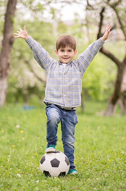 istock Little football player 476721272