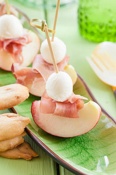 istock Slices of nectarine with smoked ham 476723466