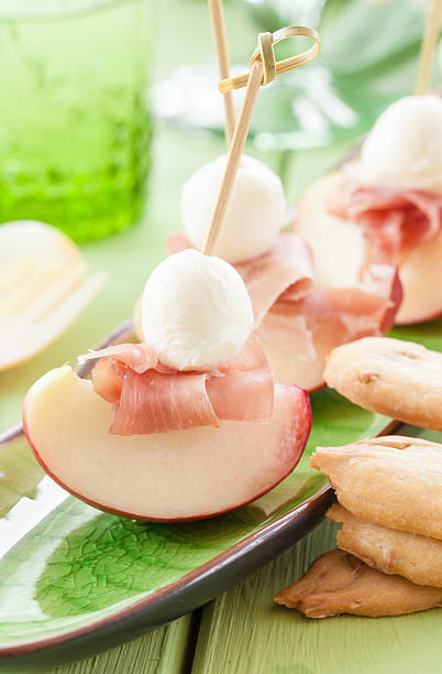 istock Slices of nectarine with smoked ham 476723468