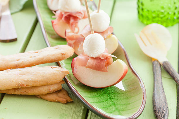 istock Slices of nectarine with smoked ham 476723470