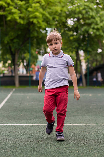 istock Little boy is playing Frisbee 476725236