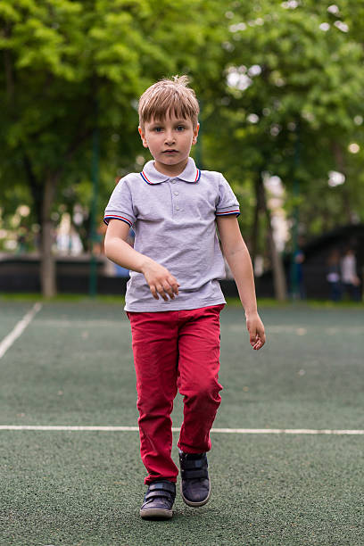 istock Little boy is playing Frisbee 476725238
