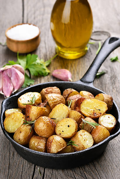 istock Baked potato in frying pan 476725462