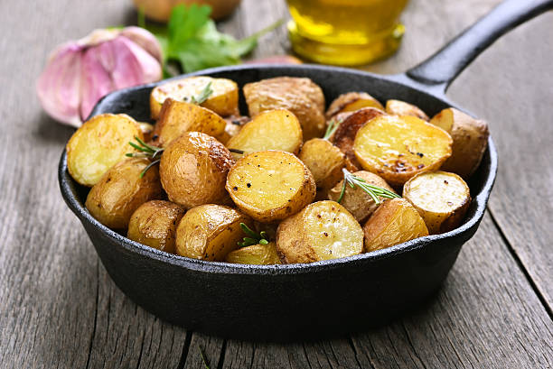 istock Baked potato in frying pan 476725486
