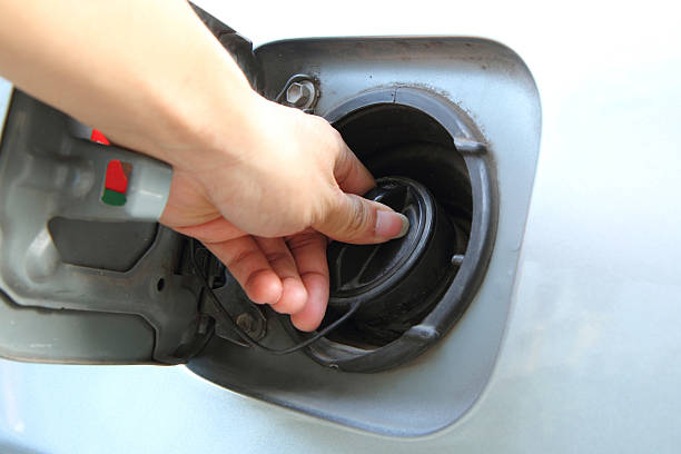 istock open the cap of fuel tank 476726152