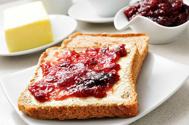 istock coffee and toasts with butter and jam 476728467