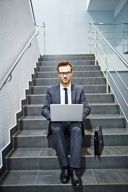 istock Businessman with laptop 476729636