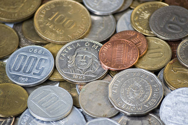 istock Coins from many countries, mostly south american ones. 476730217