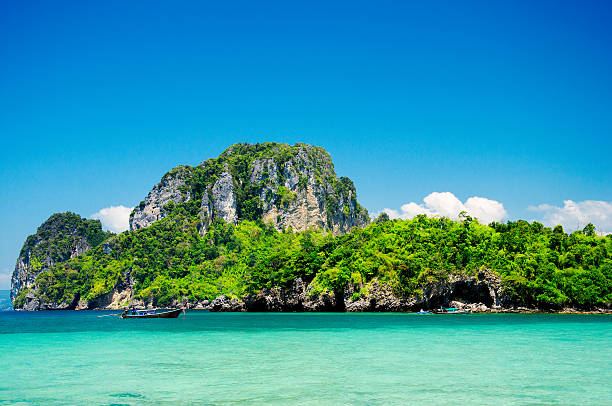 istock Long boat and poda island in Thailand 476730936
