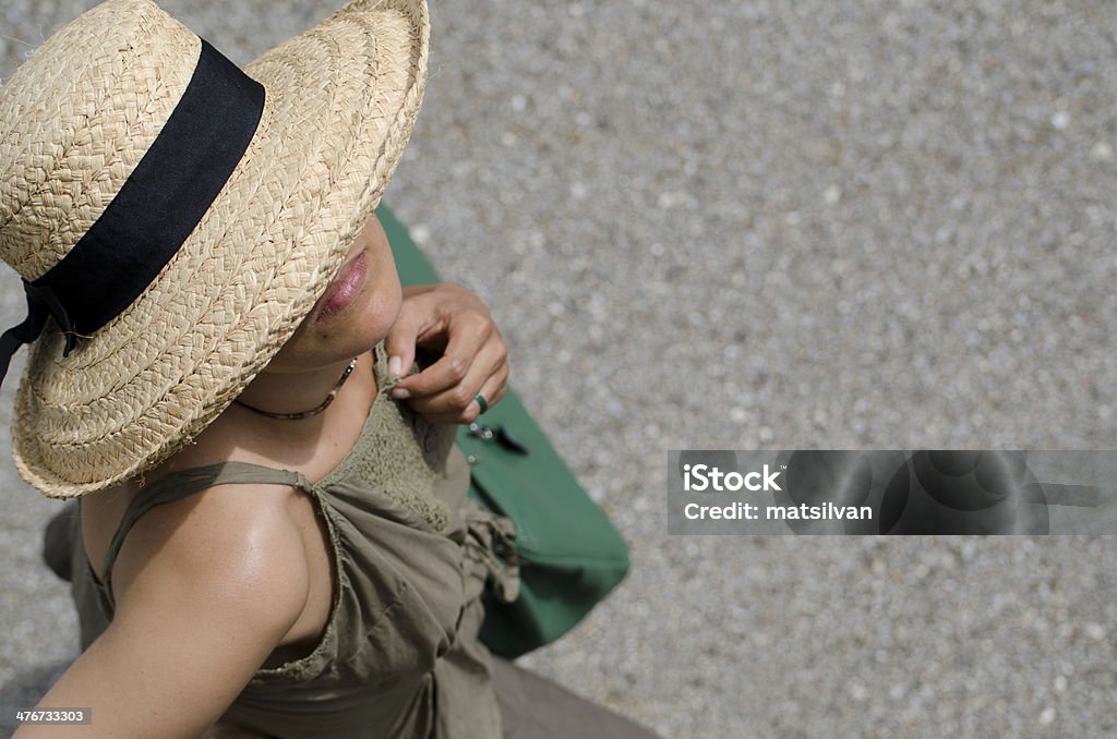 Frau mit Strohhut - Lizenzfrei Auf den Kopf gestellt Stock-Foto