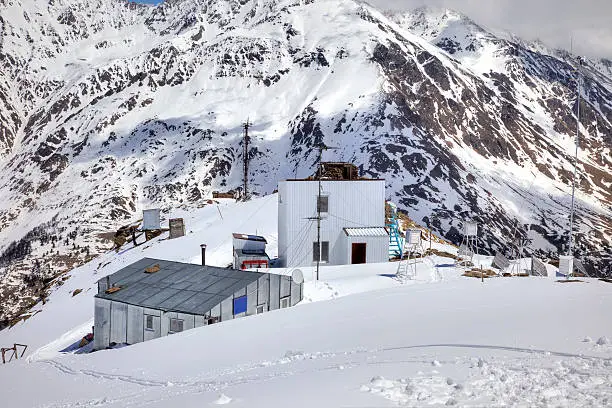 Great Caucasus Range. View of a weather station on the mountain Cheget