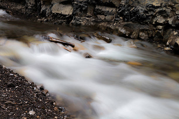 istock Cascading smooth water running down the Kananaskis river 476735644