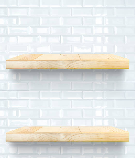 Empty Wooden Table top and shelf at white tile wall