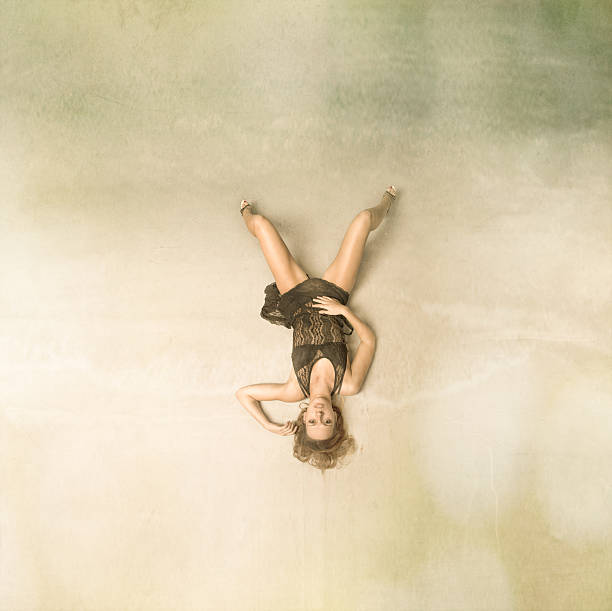 istock girl tanning on the beach 476738894