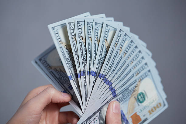 istock Money in female hands 476739944