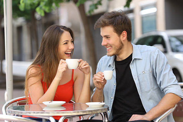 istock Couple or friends talking and drinking in a restaurant 476740036