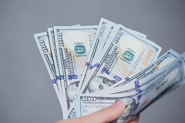 istock Money in female hands 476740270