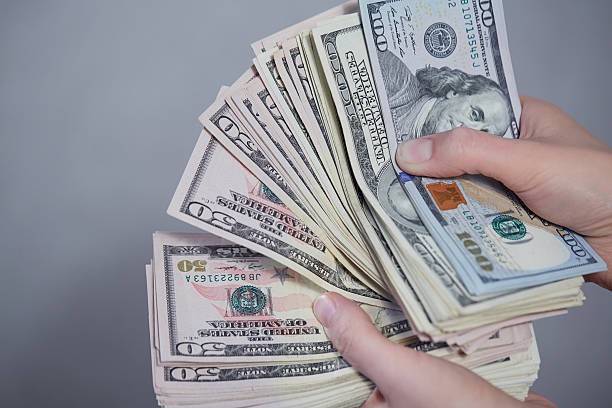 istock Money in female hands 476740662