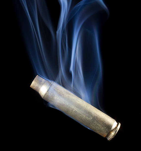 Rifle casing after a shot with smoke