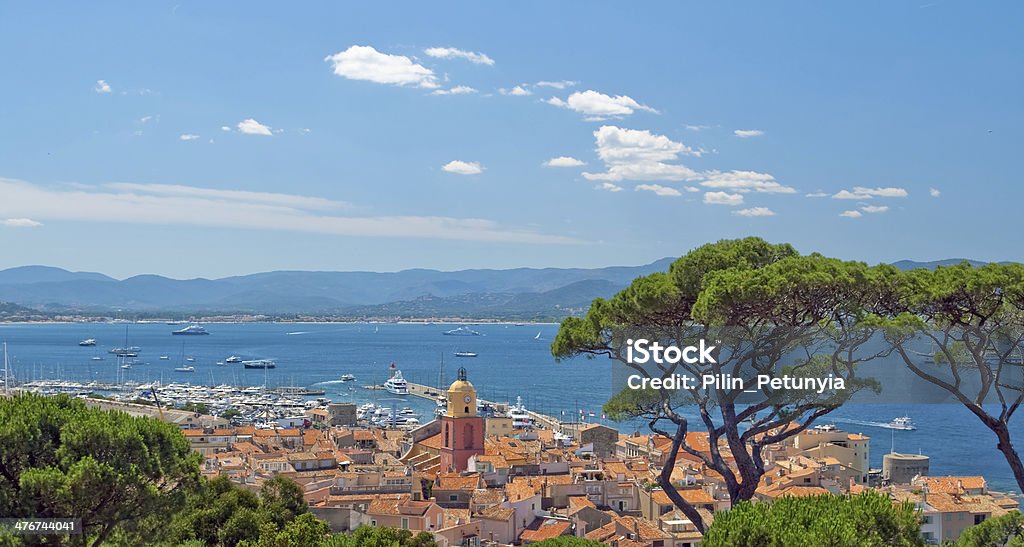 San Tropez with top view, France Image made with a sublime place of St Tropez, where the red roofs of the houses and the azure shore away from the horizon of the mountains. St Tropez Stock Photo