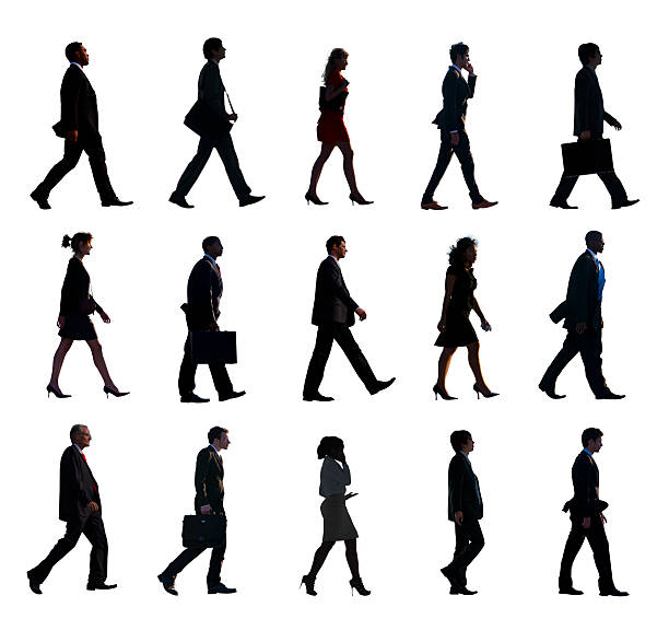 istock Silhouette Group of People in a Row 476746660