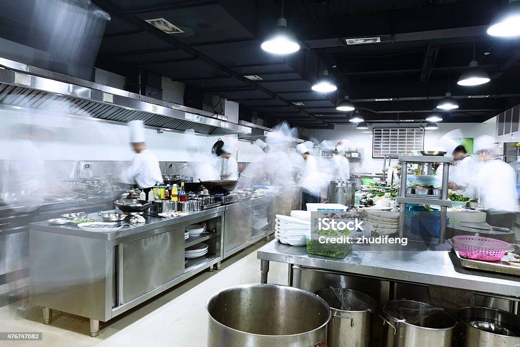 modern kitchen and busy chefs Commercial Kitchen Stock Photo