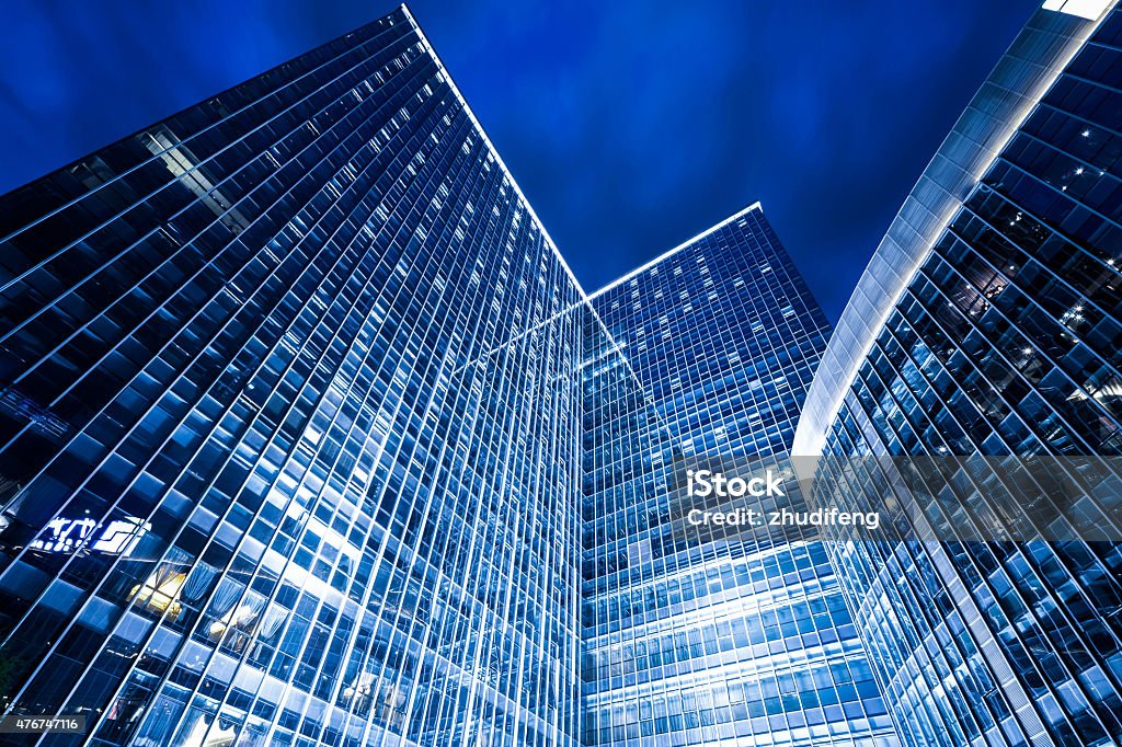 low angle view of illuminated modern building exterior 2015 Stock Photo