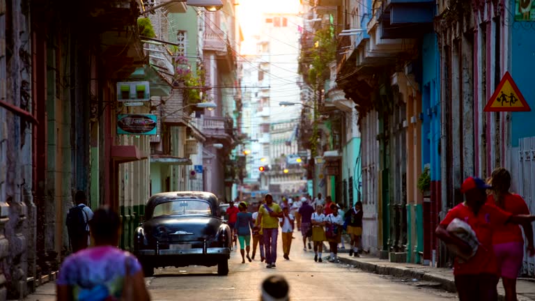 Street in Havana, Cuba with vintage American Car