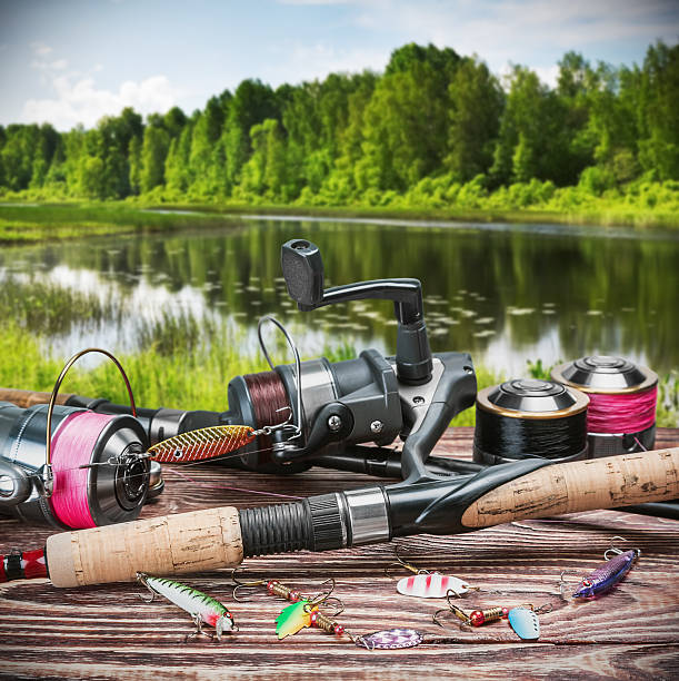 fishing tackle and accessories on the table stock photo